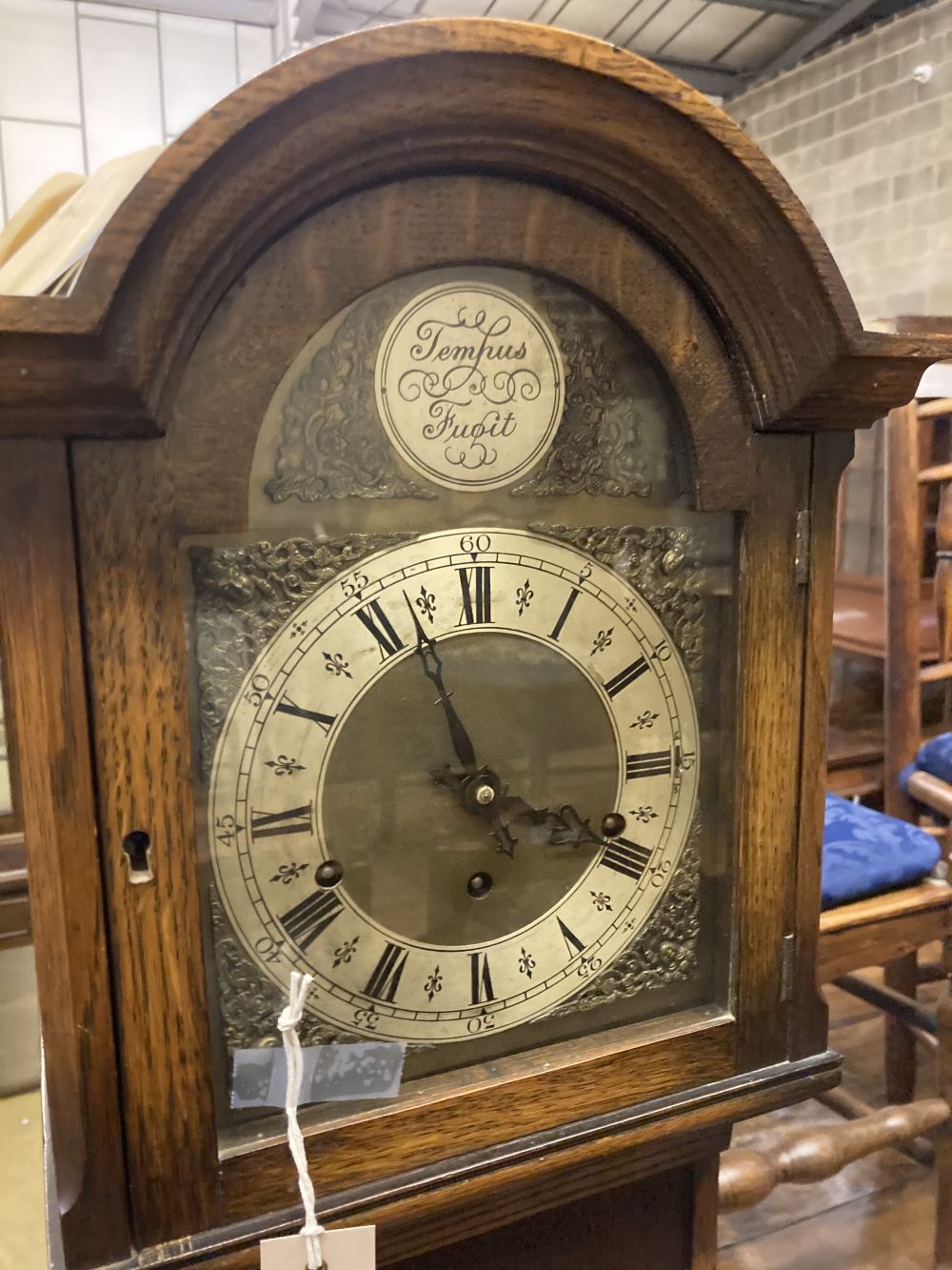 A 1930s oak cased eight day striking and chiming longcase clock, height 169cm